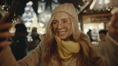 Selfie time. Gorgeous blonde smiling and burning bright sparklers on New Year's Stock Footage 144226508