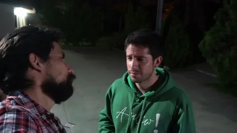 Selfie of two drunk friends talking to the camera and disoriented at a night 库存影片 170014235