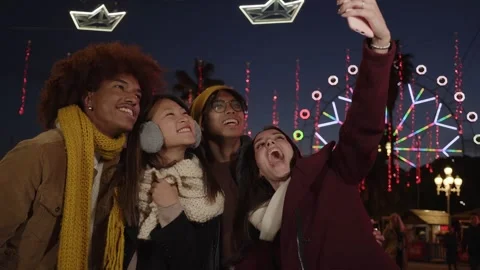 Selfie video phone multiracial group happy colleagues having fun winter. Young Stock Footage 253096536