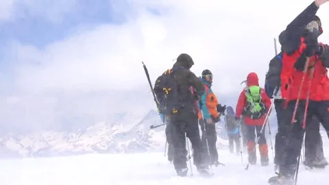 Selfies on the mountain on the background of the strong wind. Stock Footage 69100967