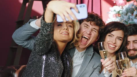 Selfies time at Christmas stuff party group of workers smiling large and posing Stock Footage 132638856