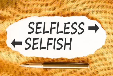 Selfless instead selfish words symbol. Concept words Selfless Selfish on be.. Fotos de archivo
