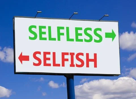 Selfless instead selfish words symbol. Concept words Selfless Selfish on be.. Fotos de archivo