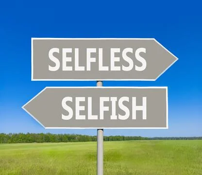 Selfless instead selfish words symbol. Concept words Selfless Selfish on be.. Fotos de archivo