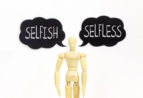 Selfless instead selfish words symbol. Concept words Selfless Selfish on sp.. Fotos de archivo