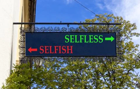 Selfless instead selfish words symbol. Concept words Selfless Selfish on be.. Fotos de archivo