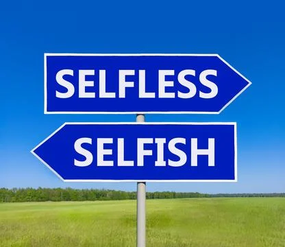 Selfless instead selfish words symbol. Concept words Selfless Selfish on be.. Fotos de archivo