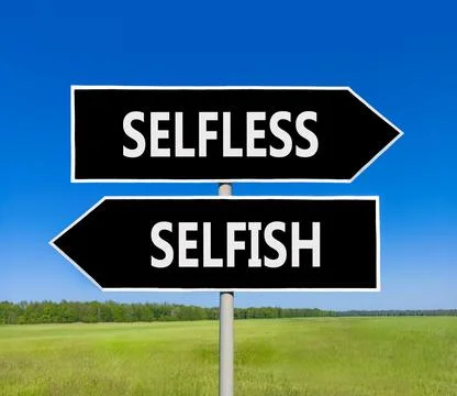 Selfless instead selfish words symbol. Concept words Selfless Selfish on be.. Fotos de archivo