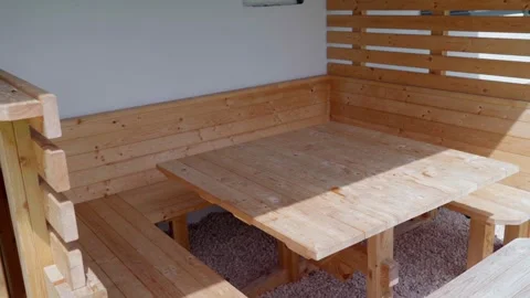 Selfmade sittig area made out of wood Stock Footage 283341608