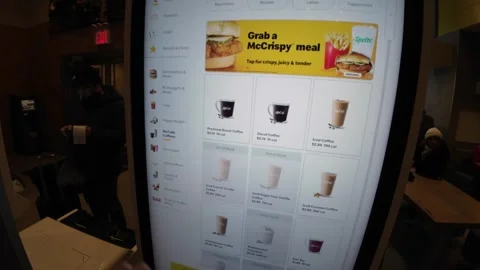 SelfOrder Kiosk Menu available in a modern Fast Food Restaurant setting today Vidéo 291510526