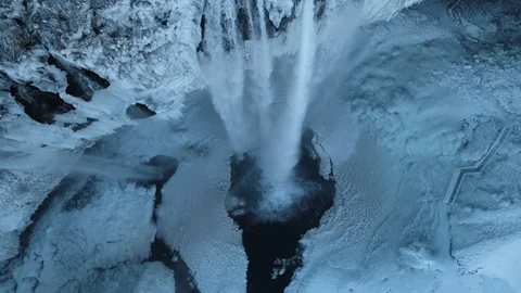 Seljalandsfoss Waterfall Rotating View from Above in Winter Stock Footage 85679248