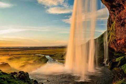 Seljalandsfoss waterfall at sunset, Iceland Stock Photos
