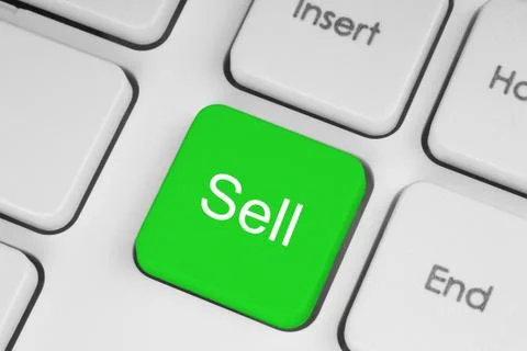 Sell green button on the keyboard Stock Photos
