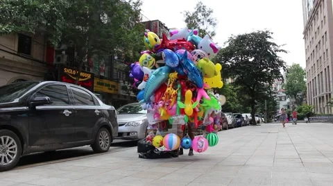 Sell toys on the sidewalk Stock Footage 58626667
