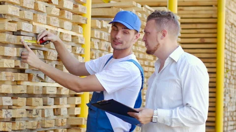 Seller does measurements, at that time when the buyer writes down results Stock Footage 57096494