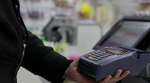 Seller Gaining PIN Code at the Terminal Stock Footage 60577972
