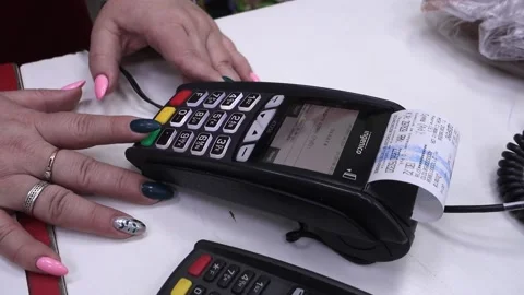 The seller issues a check at the checkout. Stock Footage 219747926