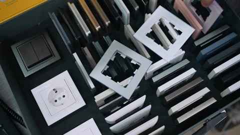 The seller offers a range of frames for switches and sockets. Stock Footage 271580979