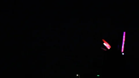 Selling glow lights on the beach Stock Footage 80582928