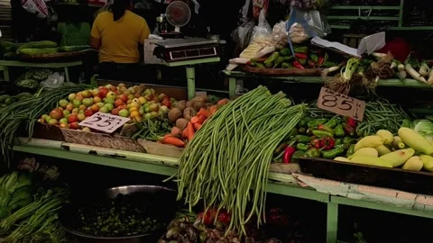 Selling Long String Beans and Other Vegetables in Public Market Stock Footage 235884577