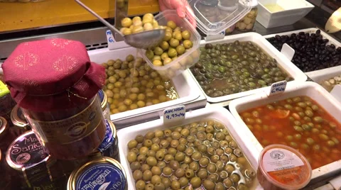 Selling olives in delicates store  Stock Footage 35627757