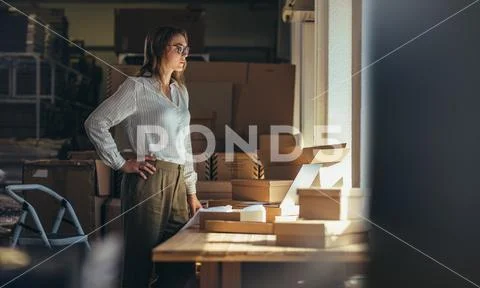 Selling online business owner at office Stock Photos