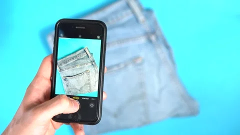 Selling second hand jeans Video stock 248532249