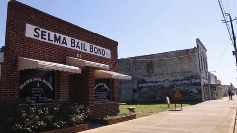 Selma Bail Bonds + James Reeb Murder Site and Memorial Slider Shot Stock Footage 76447595