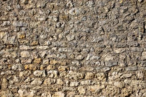 Semantically made stone background old weathered rough stones cobbled wall .. Stock Photos