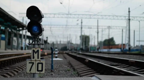 Semaphore between railway tracks. Fast moving train Stock Footage 34842297