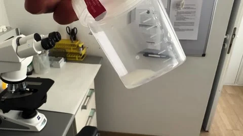 Semen Sample Container in Laboratory – Fertility Analysis Concept 動画素材 334712671