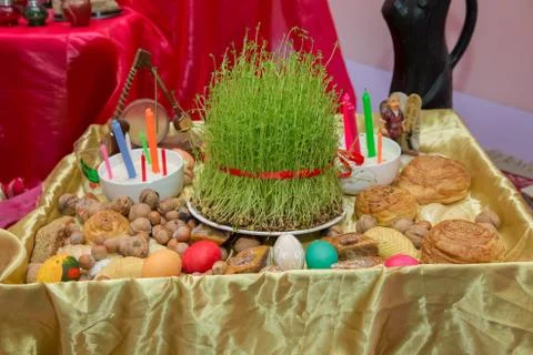 Semeni . Candle . khoncha . In hell, hazelnuts . Traditional shekerbura, eggs Stock Photos