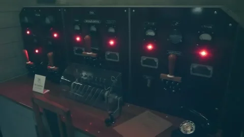 In the semi-darkness, the control panel for detonating an atomic bomb at a test 스톡 동영상 287955946