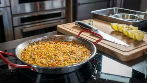 Semi-finished paella, ready for adding seafood Stock-Fotos
