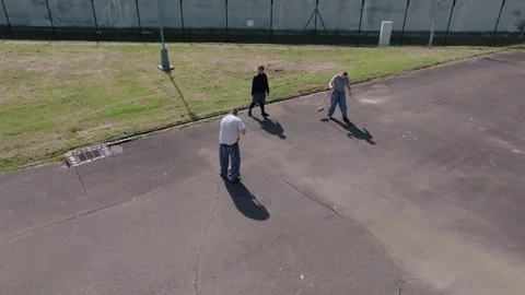 Semi orbit drone view of people in prison yard in Czech Republic Video stock 311621617