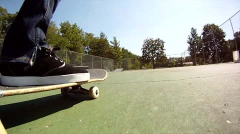 Semi professional skater does a board slide Stockbeeldmateriaal 61475203