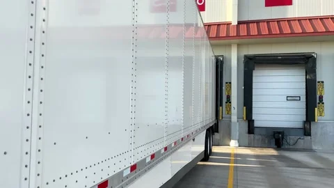 Semi trailer at dock loading/unloading Stock Footage