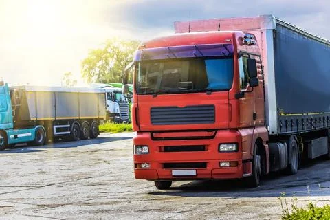 Semi-trailers in a row in the Parking Stock Photos
