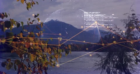 Semi-transparent dotted globe floating above lake, golden network lines and code Stock Footage 307435612
