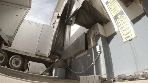 Semi-Truck Backing into Dock at a Warehouse Stock Footage 70073916