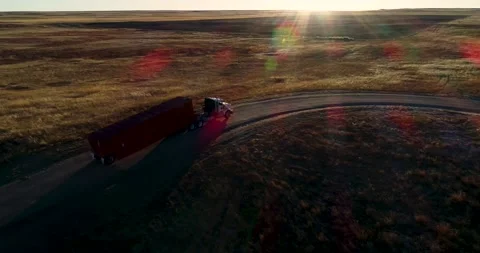 A semi truck drives onto a fracking pad to deliver equipment for a future Stock Footage 167622955
