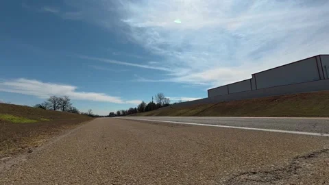 Semi Truck Passing Low Angle Camera on Historic Route 66 Stock Footage 344694341