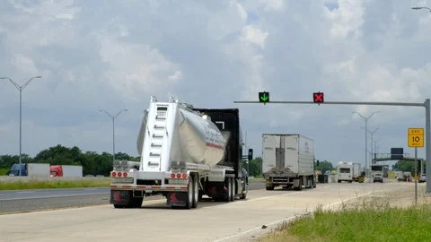 Semi trucks entering open DOT inspection and truck scales 스톡 동영상 120232979