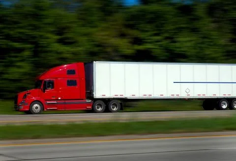 Semi Trucks on Freeway Stock Photos