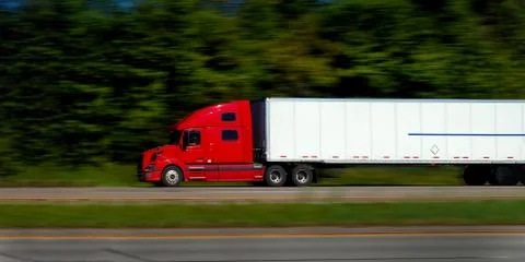 Semi Trucks on Freeway Stock Photos