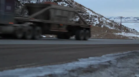 Semi Trucks Passing by on Freeway Video stock 24653827