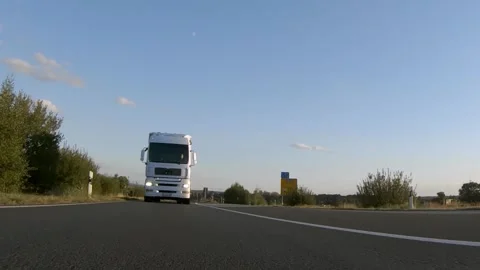 Semi trucks van cargo and parcel delivery driving on a highway. White Van delive Stock Footage 227622832
