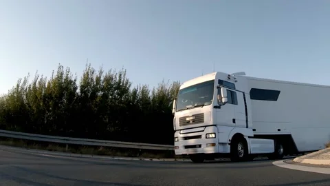 Semi trucks van cargo and parcel delivery driving on a highway. White Van delive Stock Footage 227622922