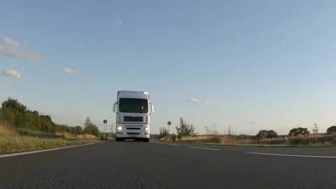 Semi trucks van cargo and parcel delivery driving on a highway. White Van delive Stock Footage 228680308