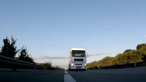 Semi trucks van cargo and parcel delivery driving on a highway. White Van delive Stock Footage 228680309